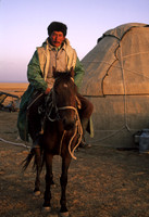 Herder and yurt, Song Kol Lake, central Kyrgyzstan