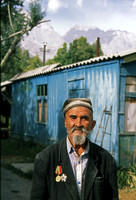 Man displaying Soviet-era medals, southern Kyrgyzstan