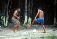 River guides playing soccer, Rio Negro, Brazil
