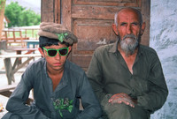 Young boy and elderly man, Old Peshawar, Pakistan