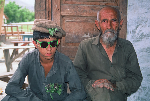 Young boy and elderly man, Old Peshawar, Pakistan