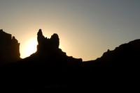 Sun setting behind Monument Valley, Utah - Arizona border